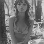 Woman in nature-themed photography, wearing a bikini.