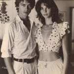 Young couple in stylish summer attire indoors.