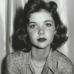 Vintage photo of a woman with freckles.