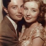 Vintage couple embracing in elegant clothing