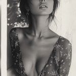 Person in floral sheer top