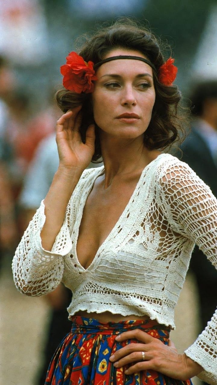 Woman in crochet top with red flowers