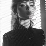 Woman in striped shirt shadows