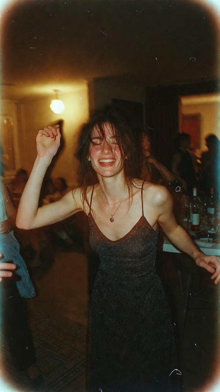 Woman dancing joyfully at indoor house party