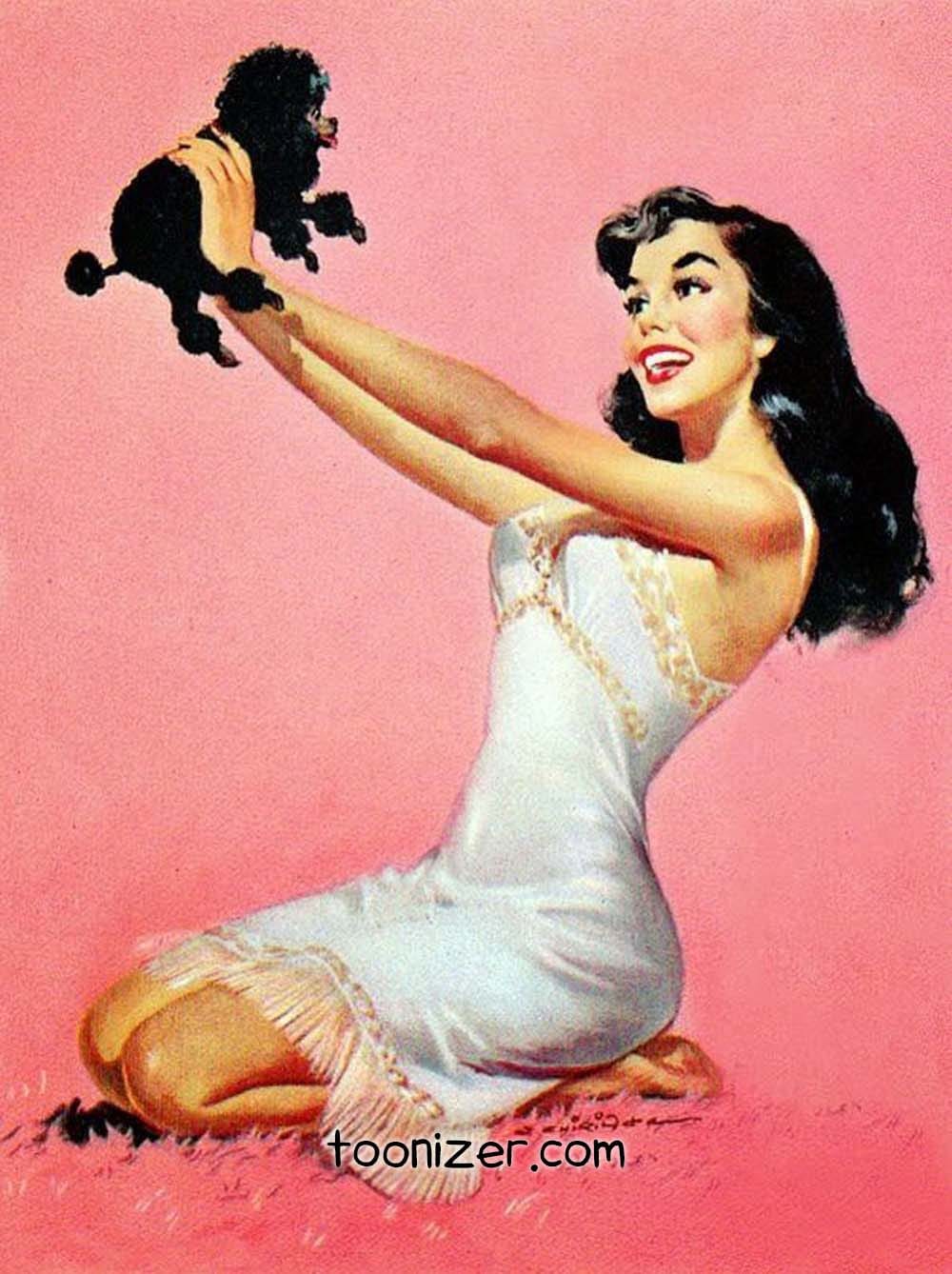 Woman joyfully holding up black poodle