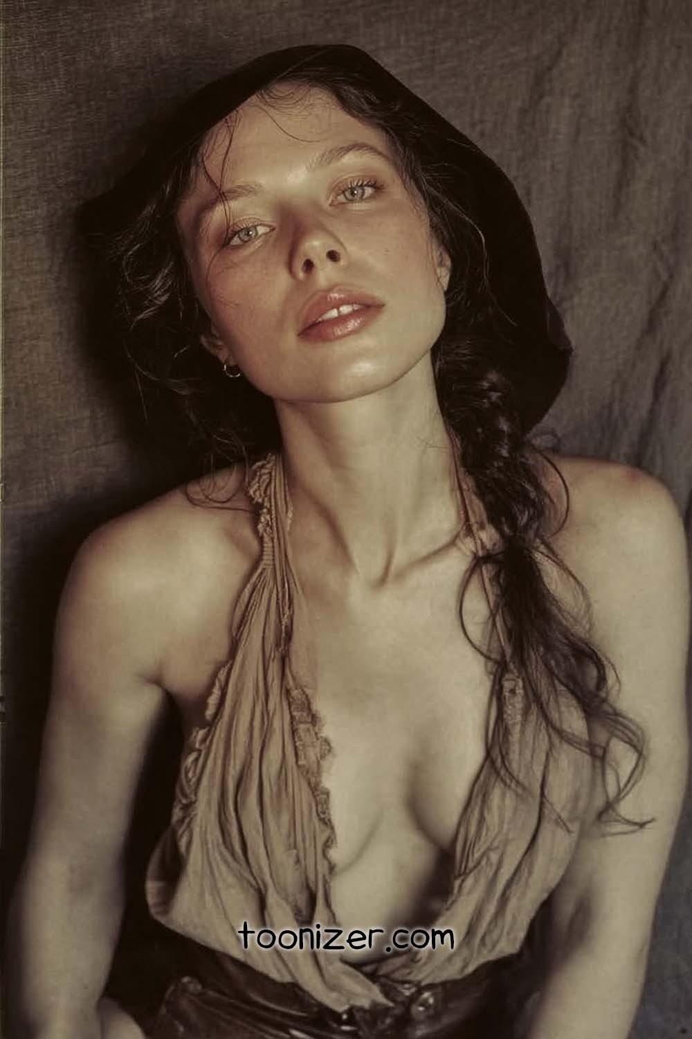 Woman in vintage-style portrait with low-cut dress