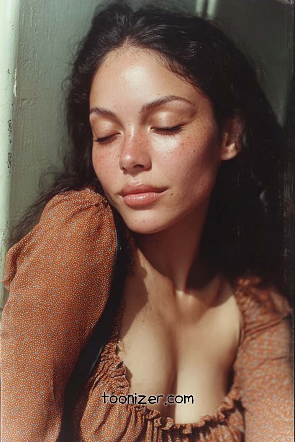 Woman with closed eyes in sunlight