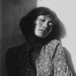 Woman in shadow with floral dress