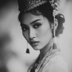 Vintage portrait of woman in traditional attire