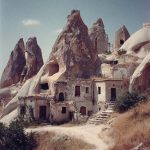 Ancient rock formations and dwellings in Cappadocia, Turkey.