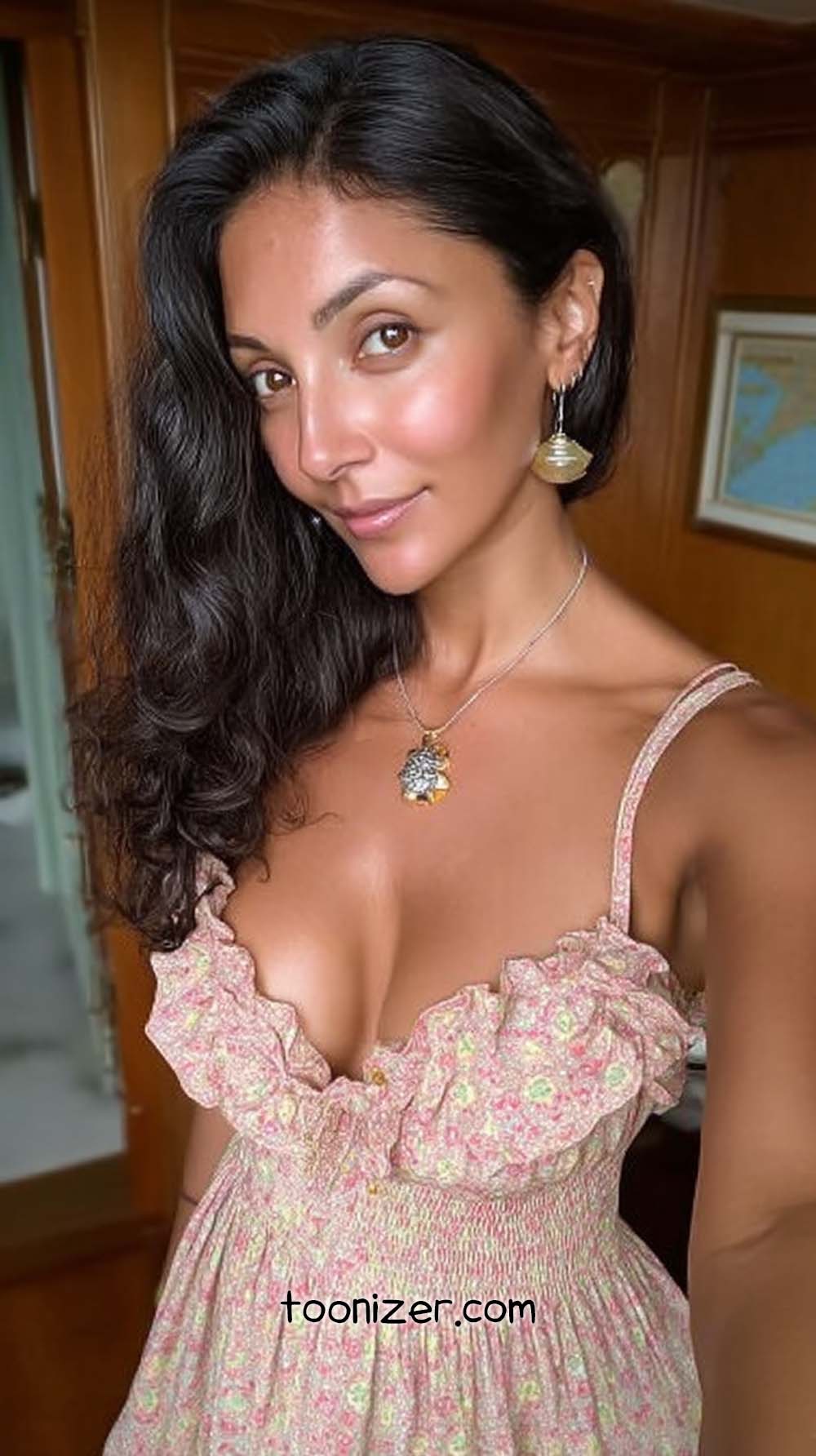 Woman in floral dress taking a selfie