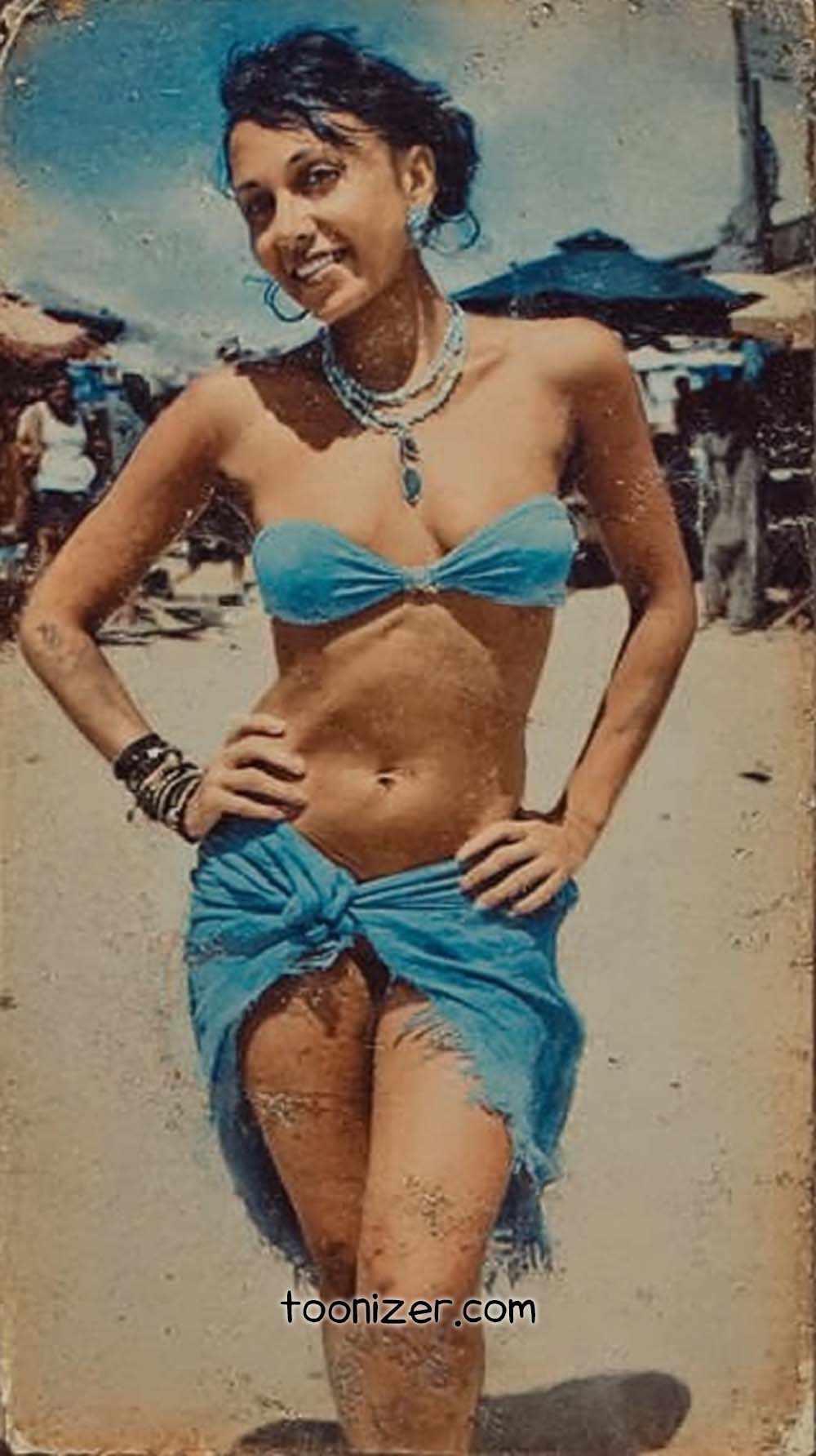 Smiling woman in beach outfit with necklace