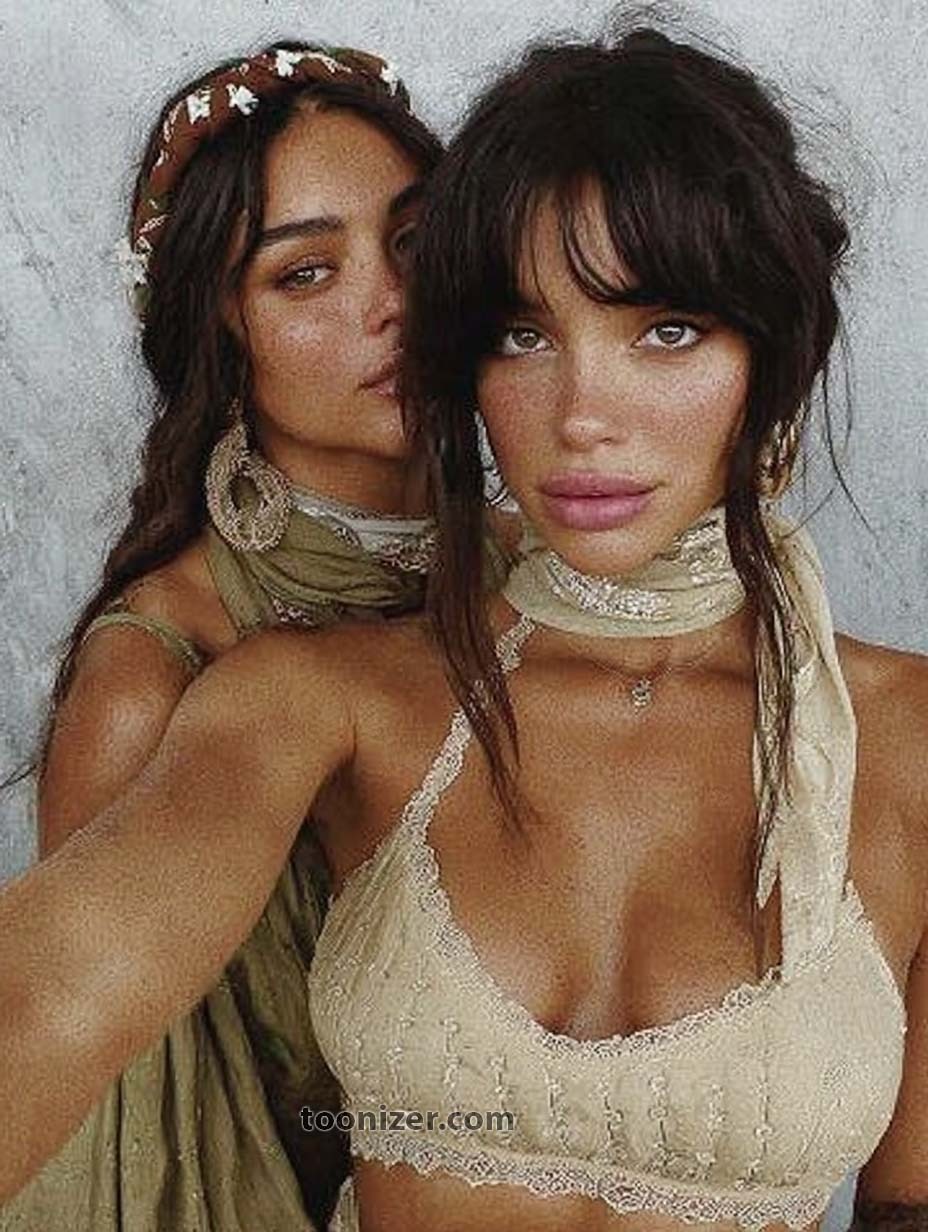 Two women wearing bohemian clothing, close-up portrait.