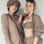 Two women in stylish matching outfits