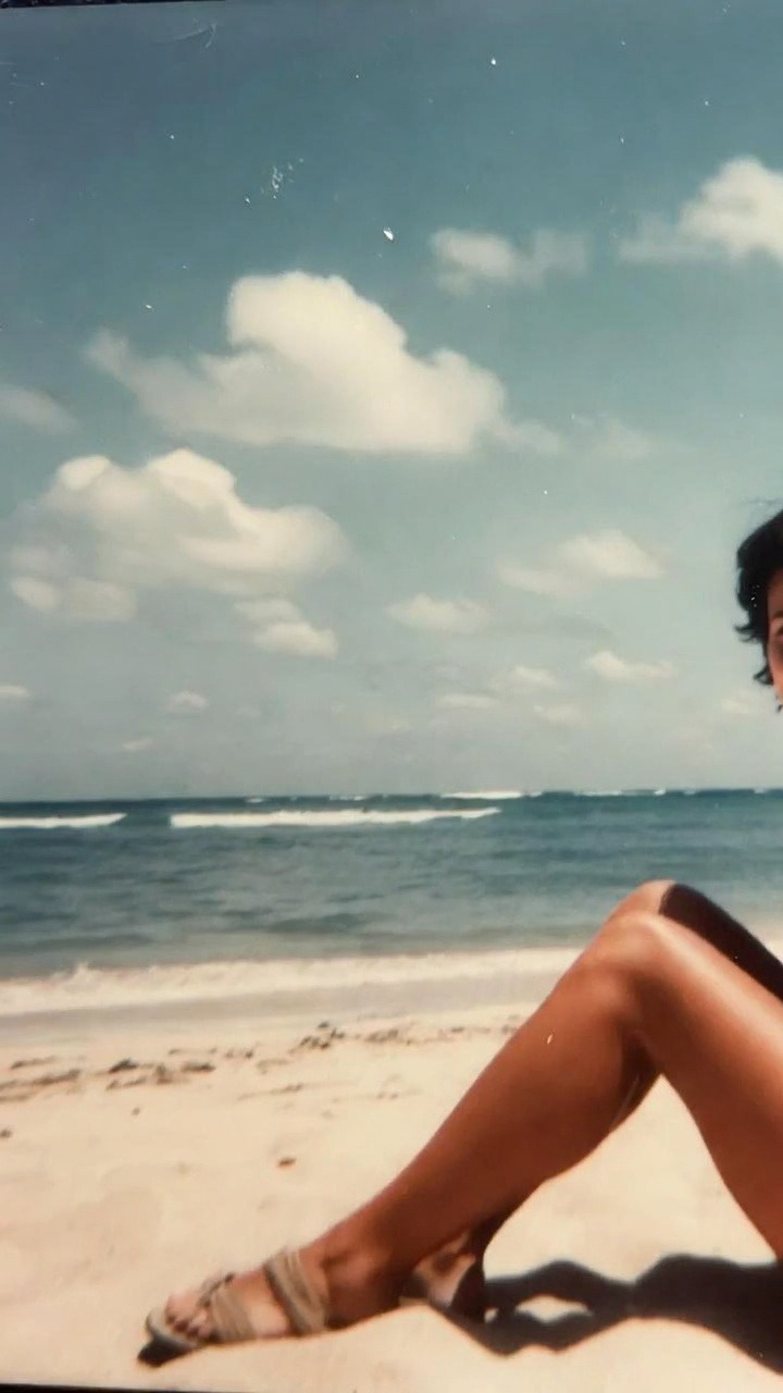 Beach with ocean waves and blue sky
