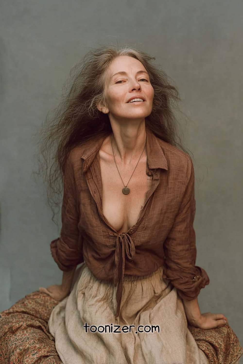 Woman posing in earthy attire