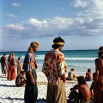 Group of young adults on sunny beach