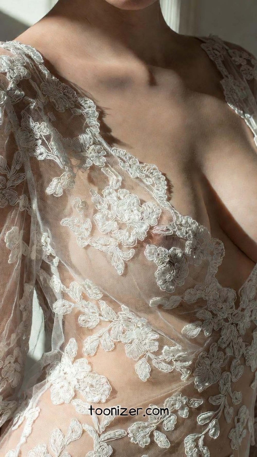Sheer lace floral fabric on skin