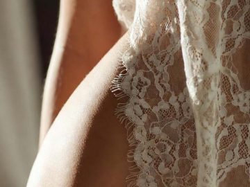 Close-up of lace fabric on skin
