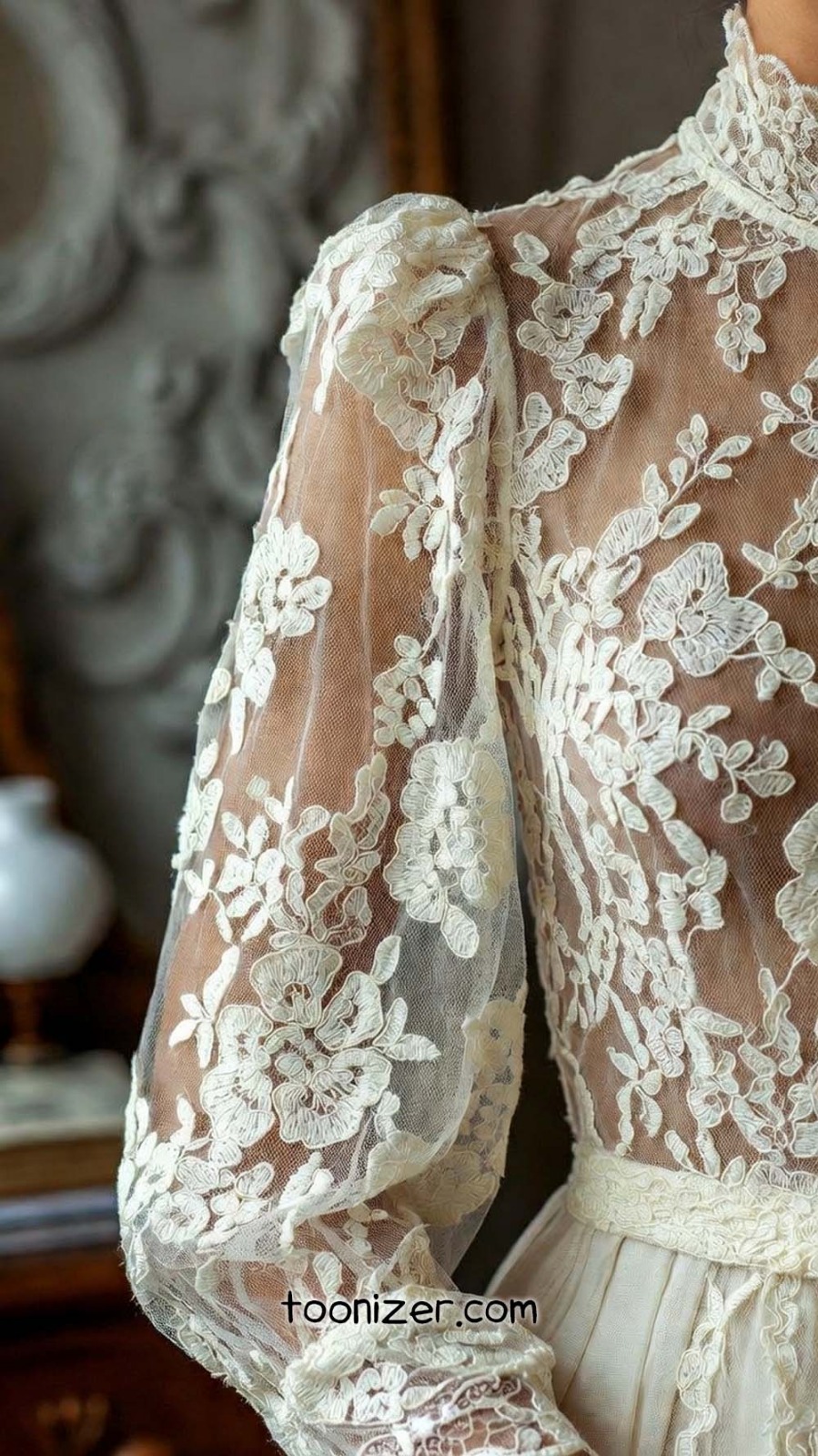 Intricate lace bridal gown sleeve