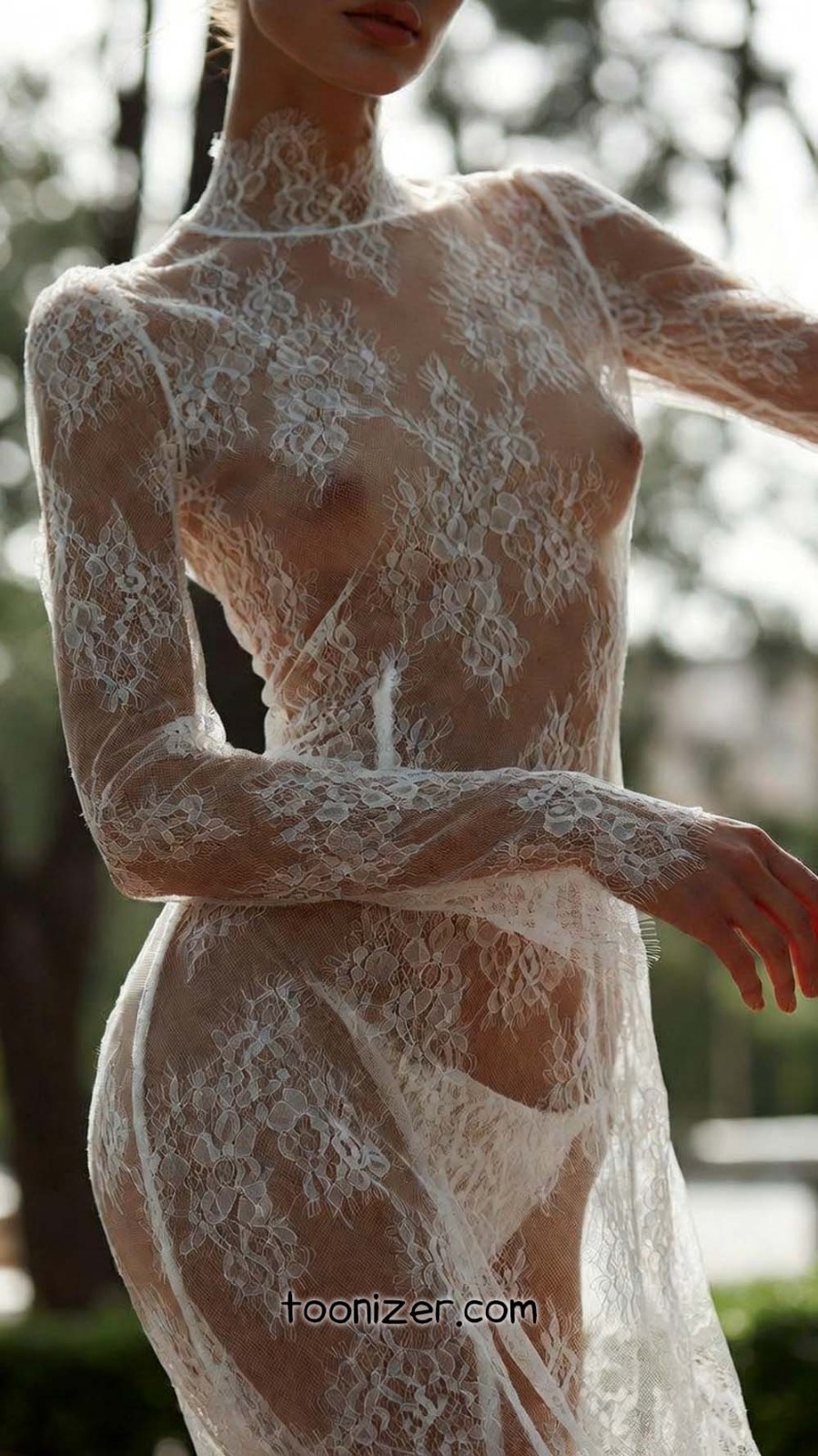 Woman in lace dress outdoors