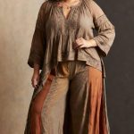 Woman in brown bohemian outfit posing confidently