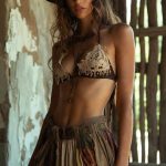 Woman in bohemian outfit and hat