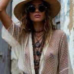 Woman in bohemian outfit and sunhat
