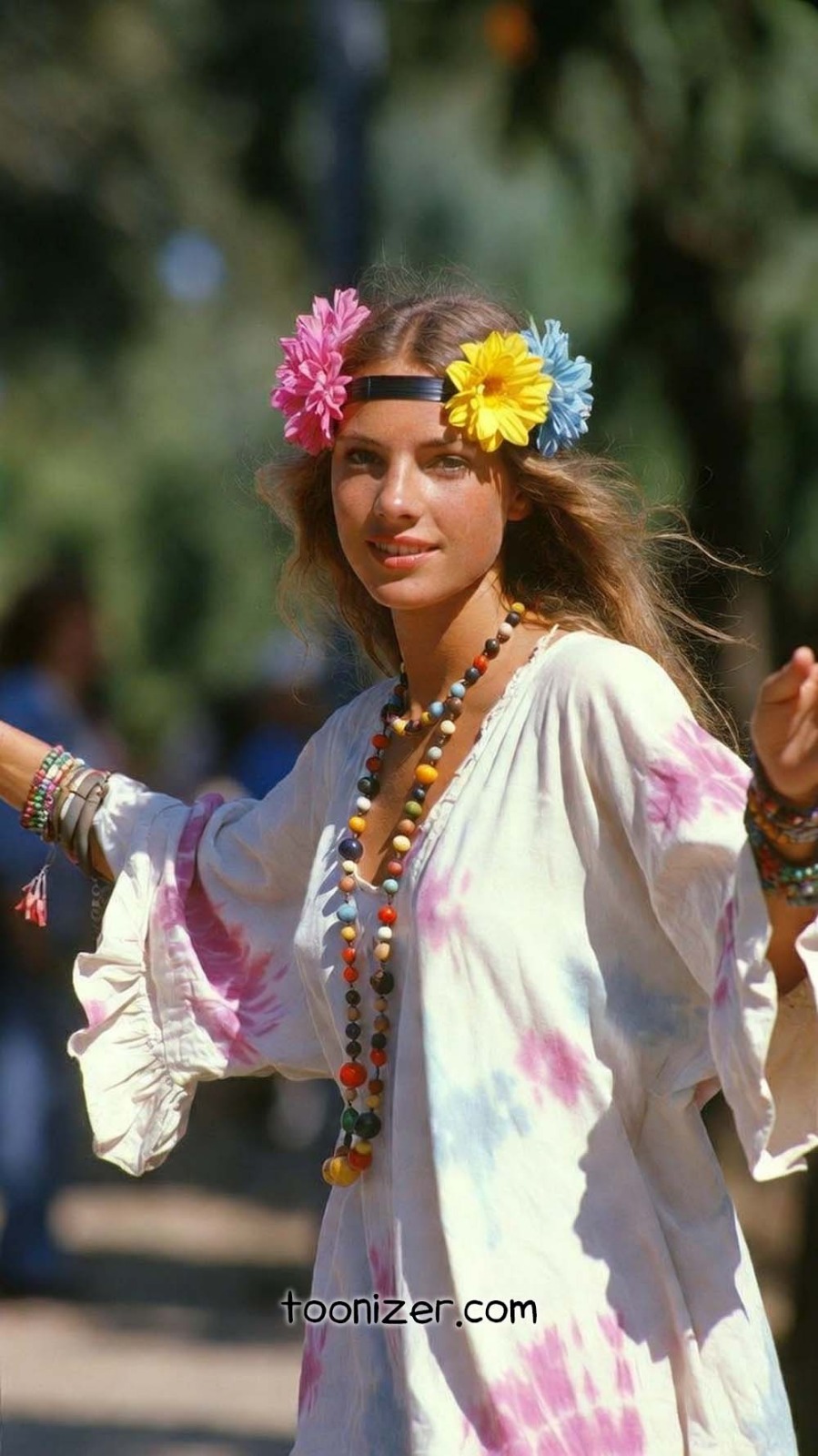 Woman in hippie attire with flower headband