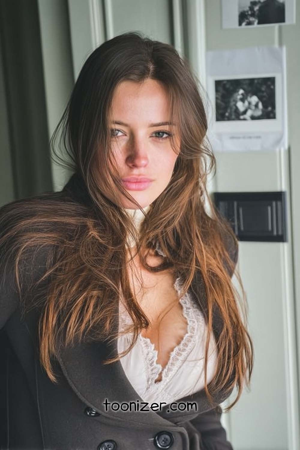 Woman with long brown hair indoors portrait
