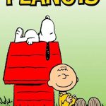Snoopy on doghouse with Charlie Brown smiling